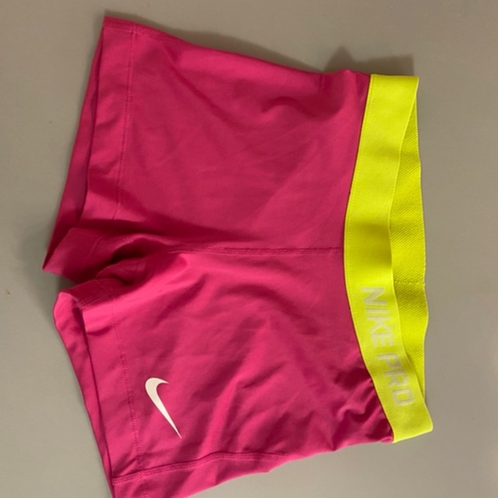 Magenta and lime green Nike Pro Shorts